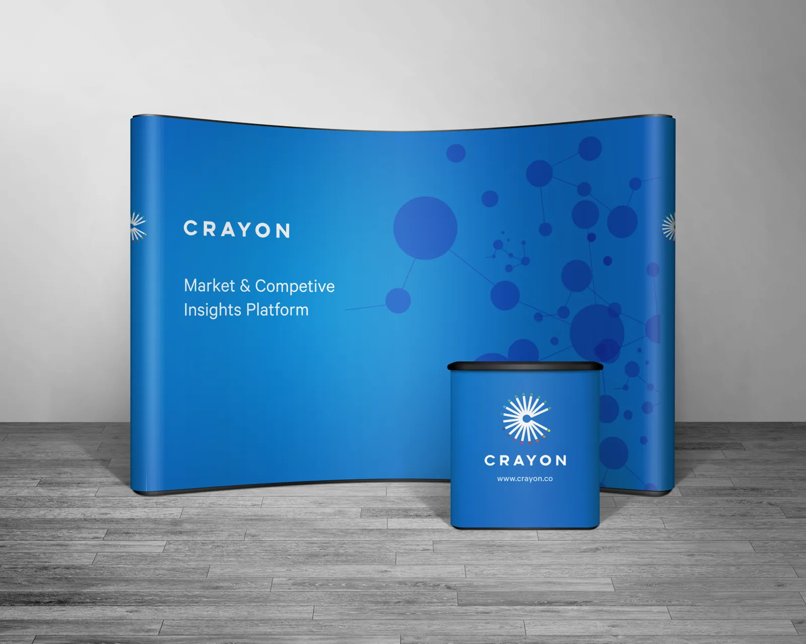 Trade show booth graphic in blue with the Crayon logo and molecule illustration